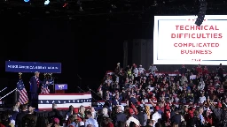 A failed mic leaves Donald Trump pacing the stage in silence for nearly 20 minutes