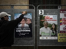 Hundreds of candidates pull out of French run-off in bid to foil far right