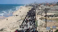 Thousands of Palestinians attempt to return home to northern Gaza, but face Israeli fire | CNN