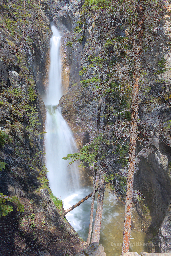 The double falls of Silverton falls as seen from the viewing area, minor rainbow action just below the split.