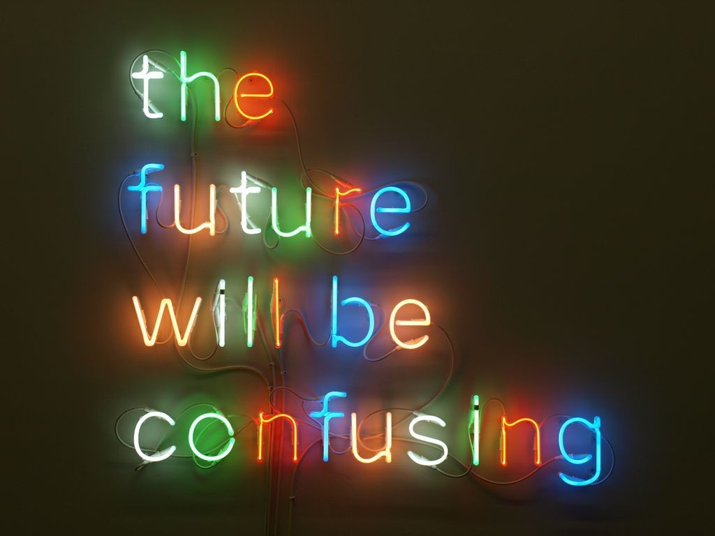 Neon sign that says "The future will be confusing" each letter is a different color