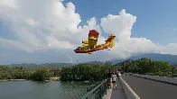 A Group of Canadian Made De Havilland Canada (Previously Canadair) CL-415 Aerial Firefighter In Action