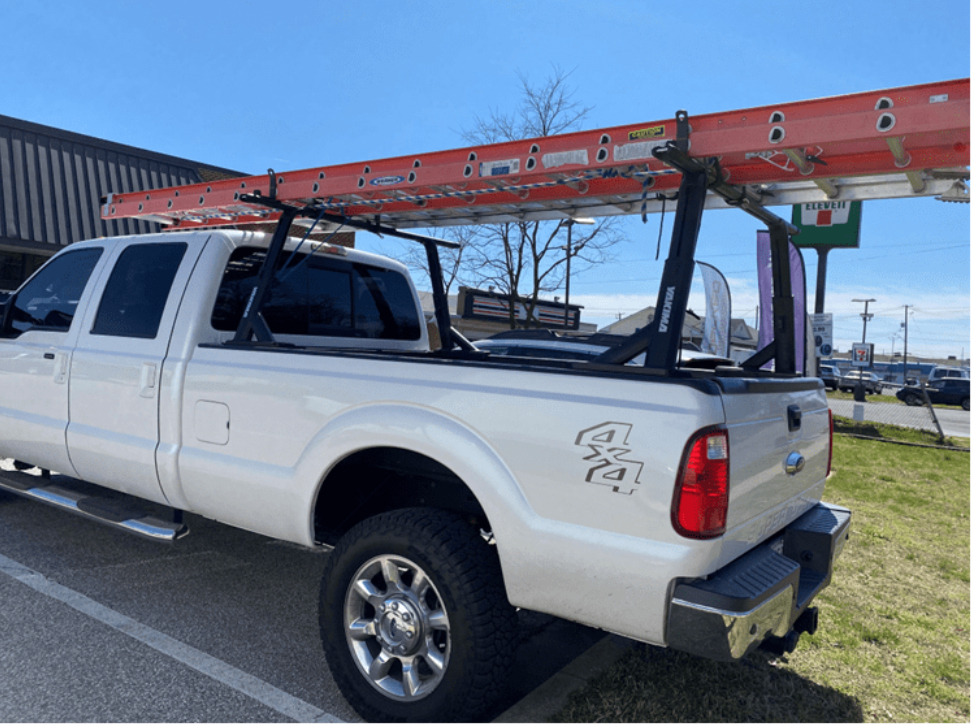 This is basically what I’m talking about, very common around me. Sometimes the load hangs outside the perimeter of the truck, at which point they secure a little red flag so you don’t rear end them and impale yourself. I’d prefer to rear end the bumper of a 22ft truck instead.