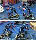 Work in progress genestealers. Washed only skin on left, highlighted skin on right.