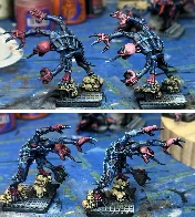 Work in progress genestealers. Washed only skin on left, highlighted skin on right.