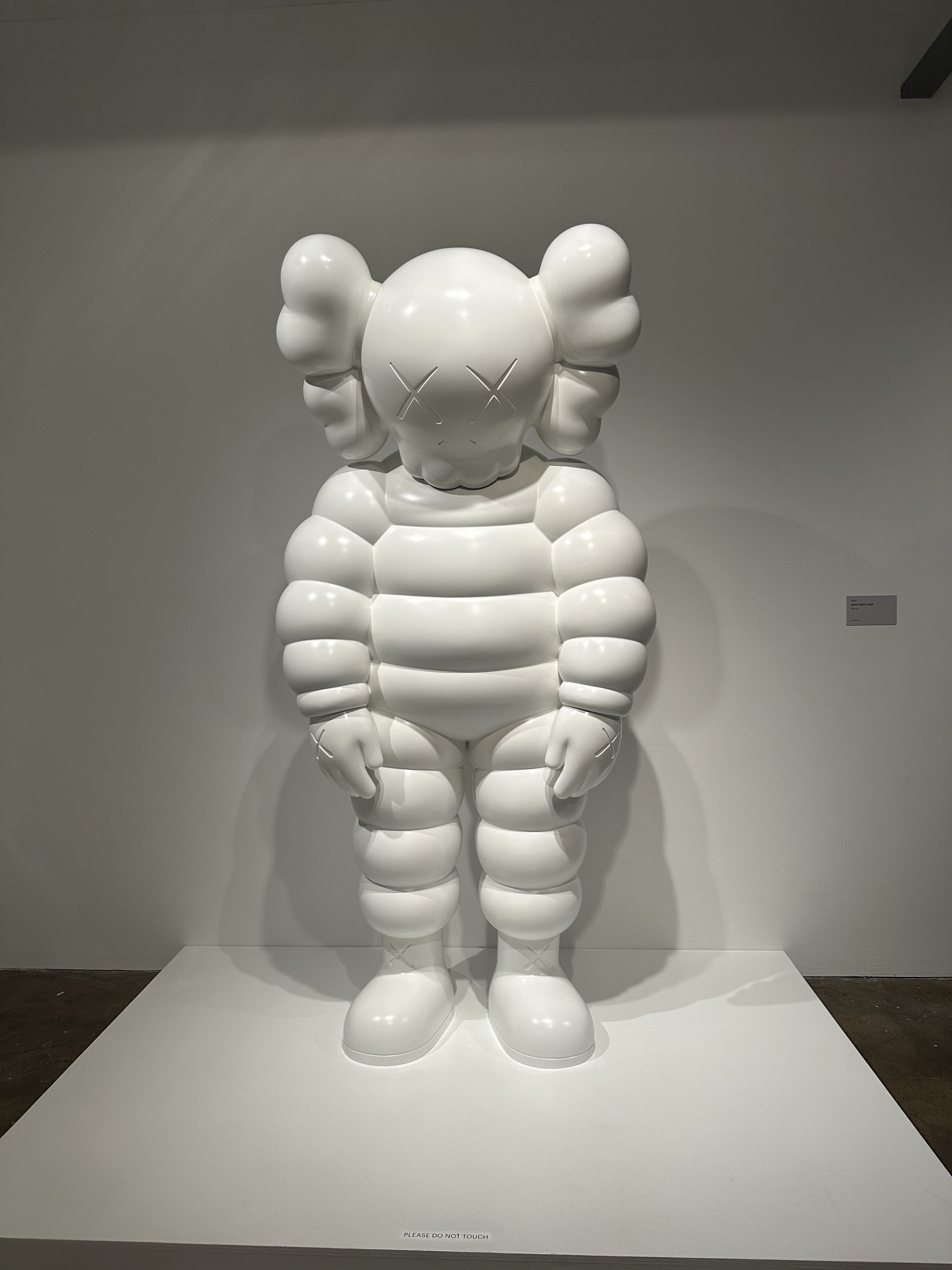 WHAT PARTY, 2020. Bronze, paint. KAWS.