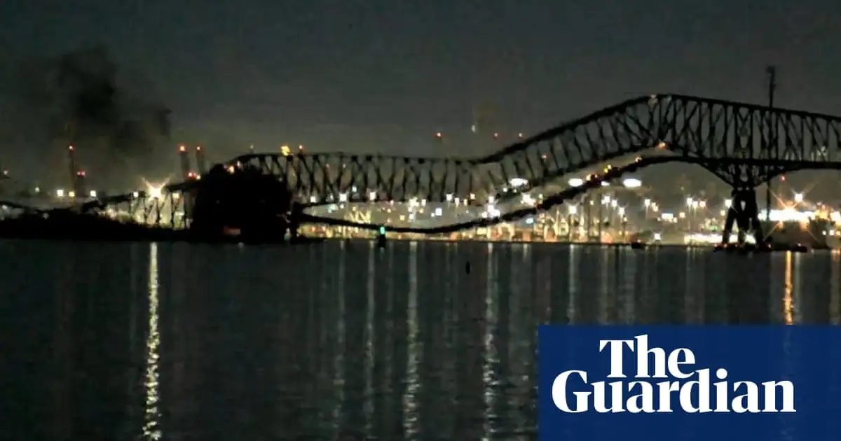 Baltimore bridge collapses into river after being hit by cargo ship