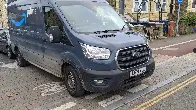 Amazon delivery vans were parked in bike lanes all over Cambridge today.