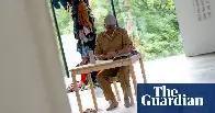 There's a brilliant art instillation at a museum in Arnhem, Netherlands, where the artist Johannes-Harm Hovinga sits at a table all day, and punches holes in the latest UN report on climate change.