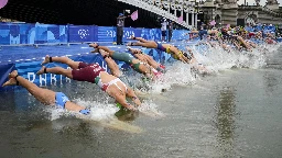 Olympic triathletes swim in Seine River after days of concerns about water quality