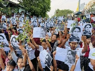 Myanmar Junta Arrests Women for Wearing or Holding Flowers