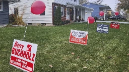 Liberal and moderate candidates take control of school boards in contentious races across US