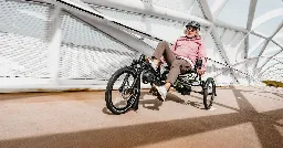 Telescoping e-trike adapts to recumbent riders short or tall