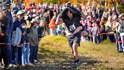 Mud, beer and cash: Annual wife-carrying championship takes Maine by storm