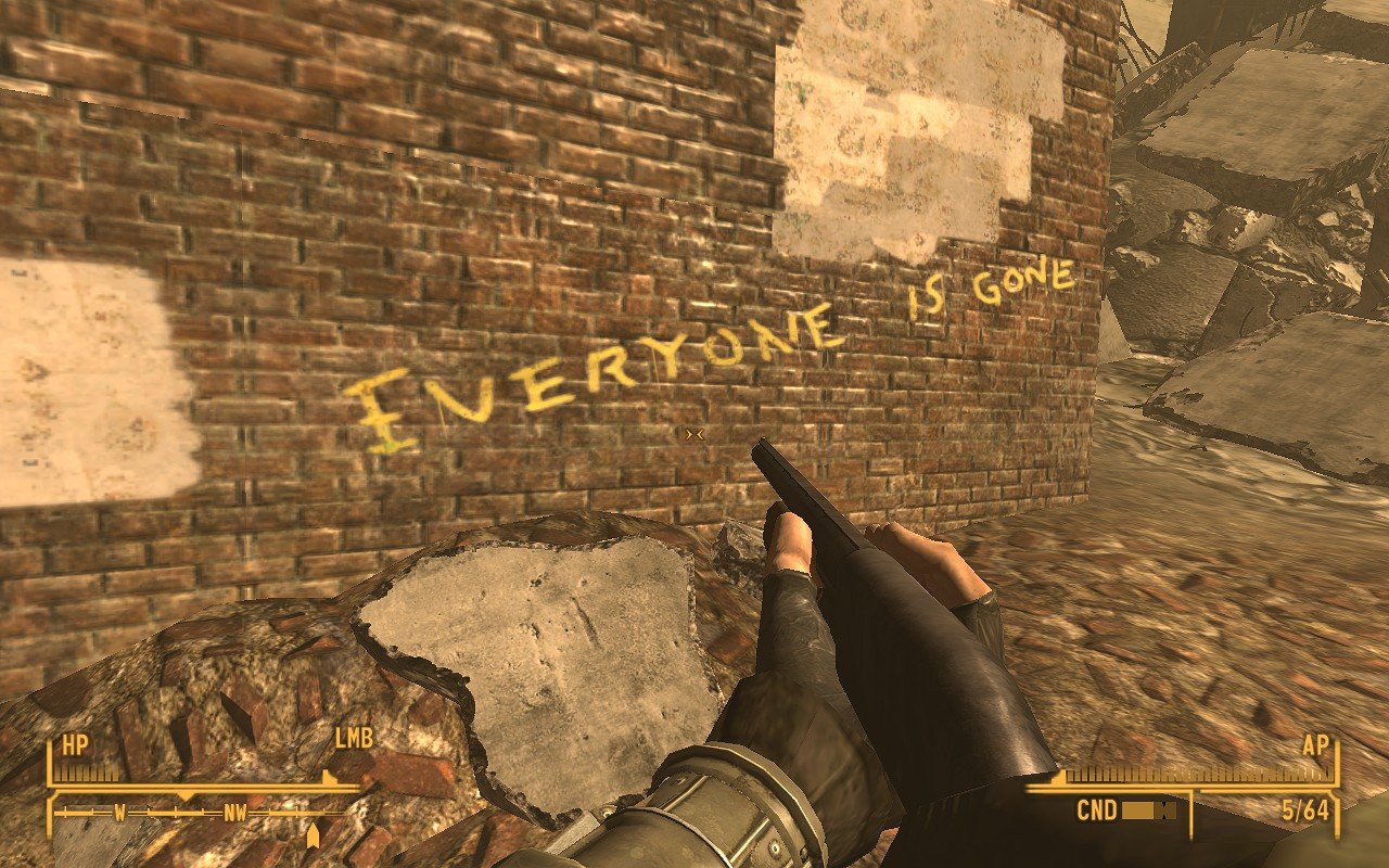 The text "Everyone is Gone" written on a brick wall