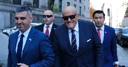 Judge scolds Giuliani for not turning over assets to two women, including car he's driving