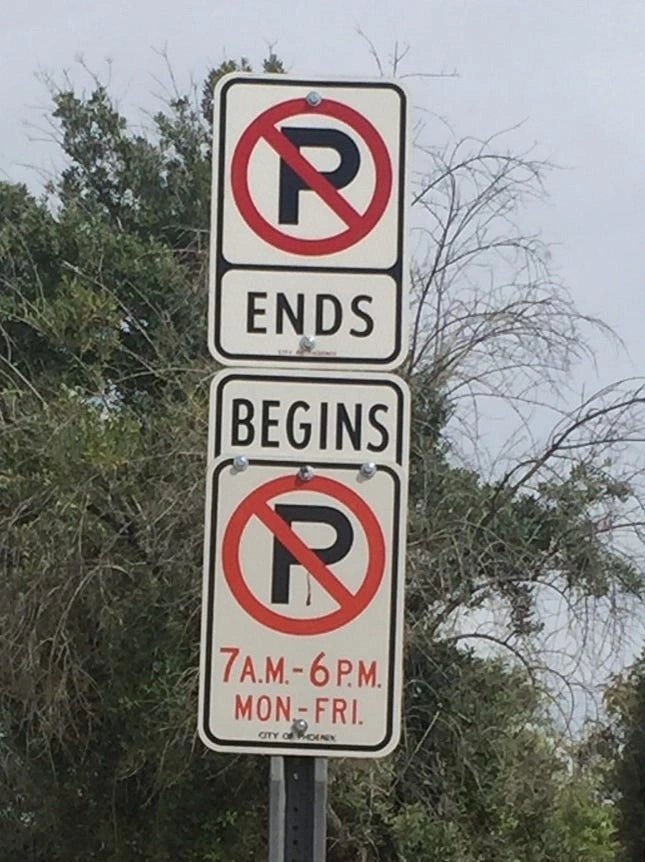 American &quot;No Parking&quot; sign, showing a backslash in the &quot;no&quot; symbol