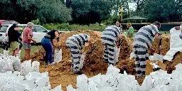 Inmates help Florida residents fill sandbags ahead of Hurricane Milton