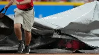 Reds groundskeeper gets caught under the tarp [ESPN Video]