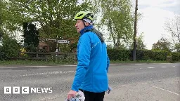 Shropshire cyclist cleans road signs as a hobby - BBC News