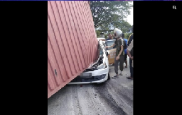 Trailer carrying container topples in Penang, killing motorist on the spot (VIDEO)