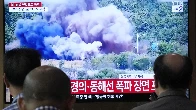 North Korea blows up parts of inter-Korean road and rail links in a symbolic display of anger