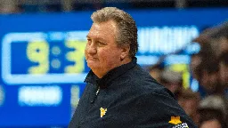 West Virginia's Huggins arrested on DUI charge