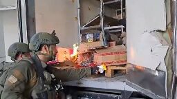 Footage appears to show Israeli troops destroying property in Gaza - as IDF says it has 'taken action'