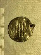 Silver Iranian coin turned into a pendant, found in Sweden, date of manufacture 931 AD-932 AD