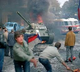 Czechoslovakians attacking an invading Soviet tank with molotovs, 1968