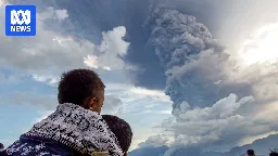 A towering column of ash threatens thousands in Indonesia amid a week of volcanic eruptions