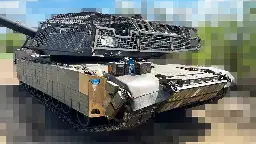 Ukrainian M1 Abrams Tanks Get Elaborate 'Cope Cages,' Soviet Explosive Reactive Armor