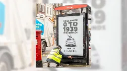 Musk mocked in Tesla 'Swasticar' poster at London bus stop