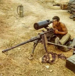 M2HB .50 caliber machinegun with AN/TVS-2 Night Vision Scope being manned [640x649]