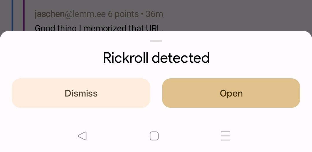 Android popup with the text "Rickroll detected" and two buttons labeled "dismiss" and "open"