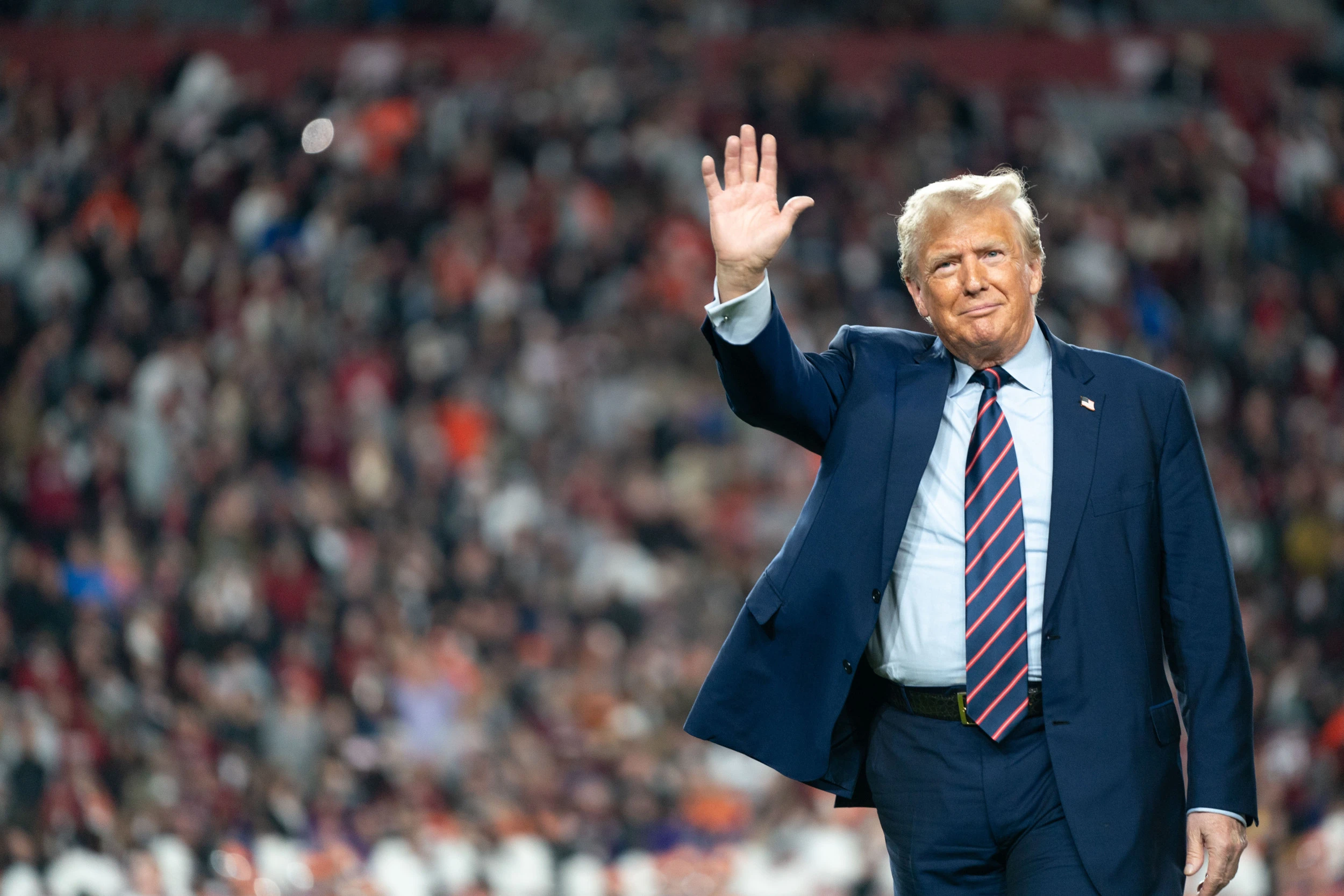 Donald Trump greeted by loud boos at South Carolina football game