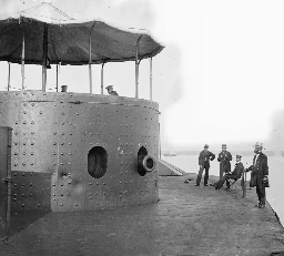 Chillin' on the deck of the USS Monitor, early ironclad, US Civil War, 1862