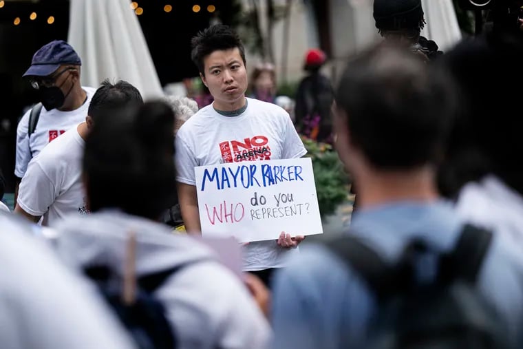 Mayor Parker endorses a downtown Sixers arena as Chinatown activists rally outside City Hall