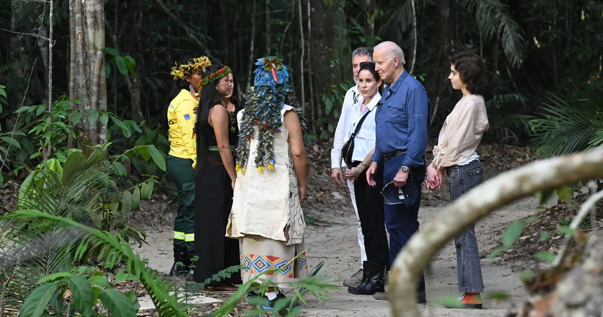 Biden says history is "watching us now" on climate as he makes first visit by sitting U.S. president to Amazon rainforest