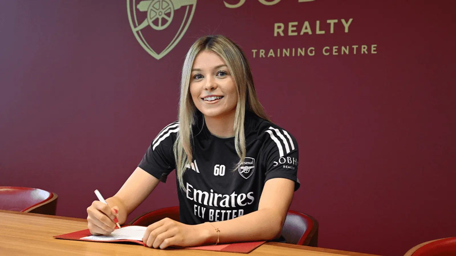 Laila Harbert signs professional contract